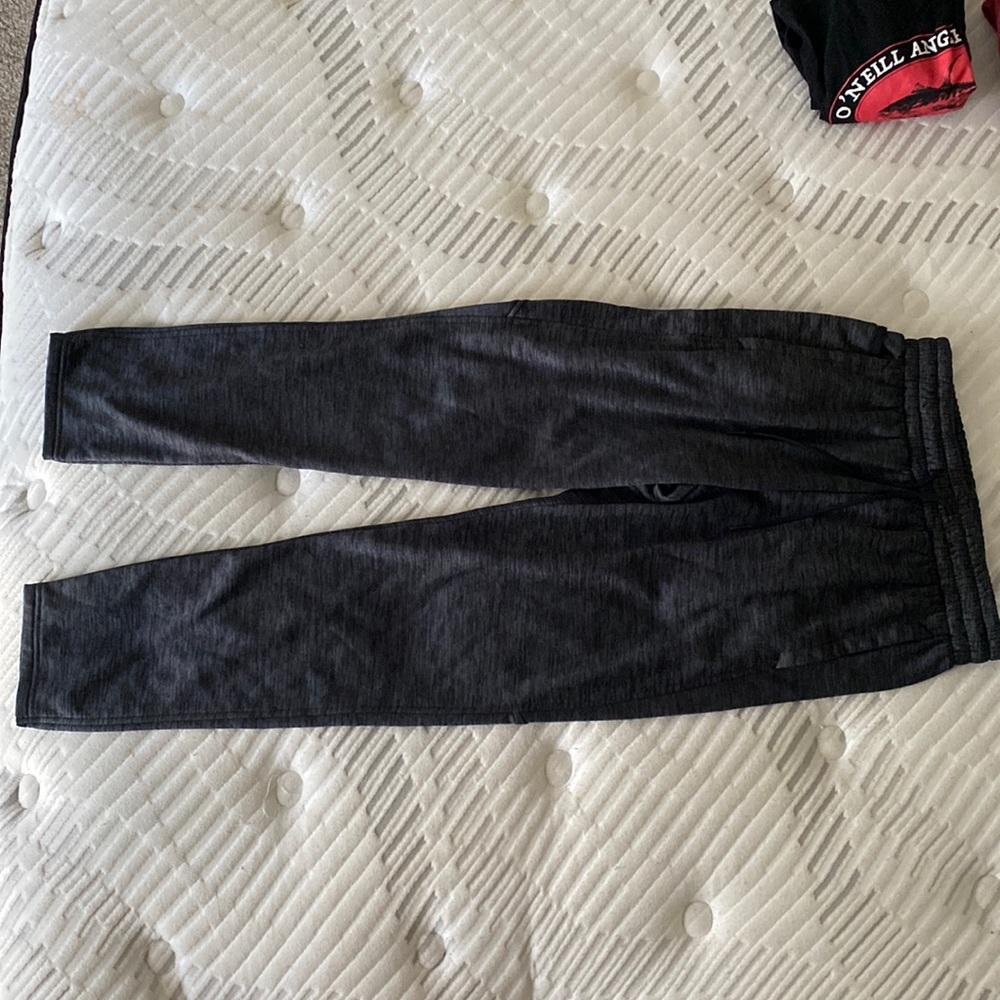 Grey under armour joggers polyester material. Mens Medium